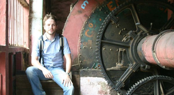 Me, posing next to the massive industrial machinery that was imported from England in the early 1900's