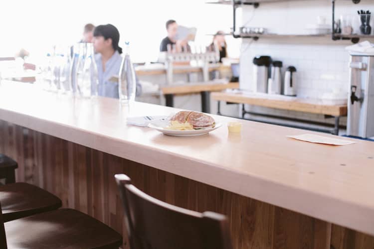 An inviting turkey and swiss sandwich waits on the bar at Union Loafers in Saint Louis.